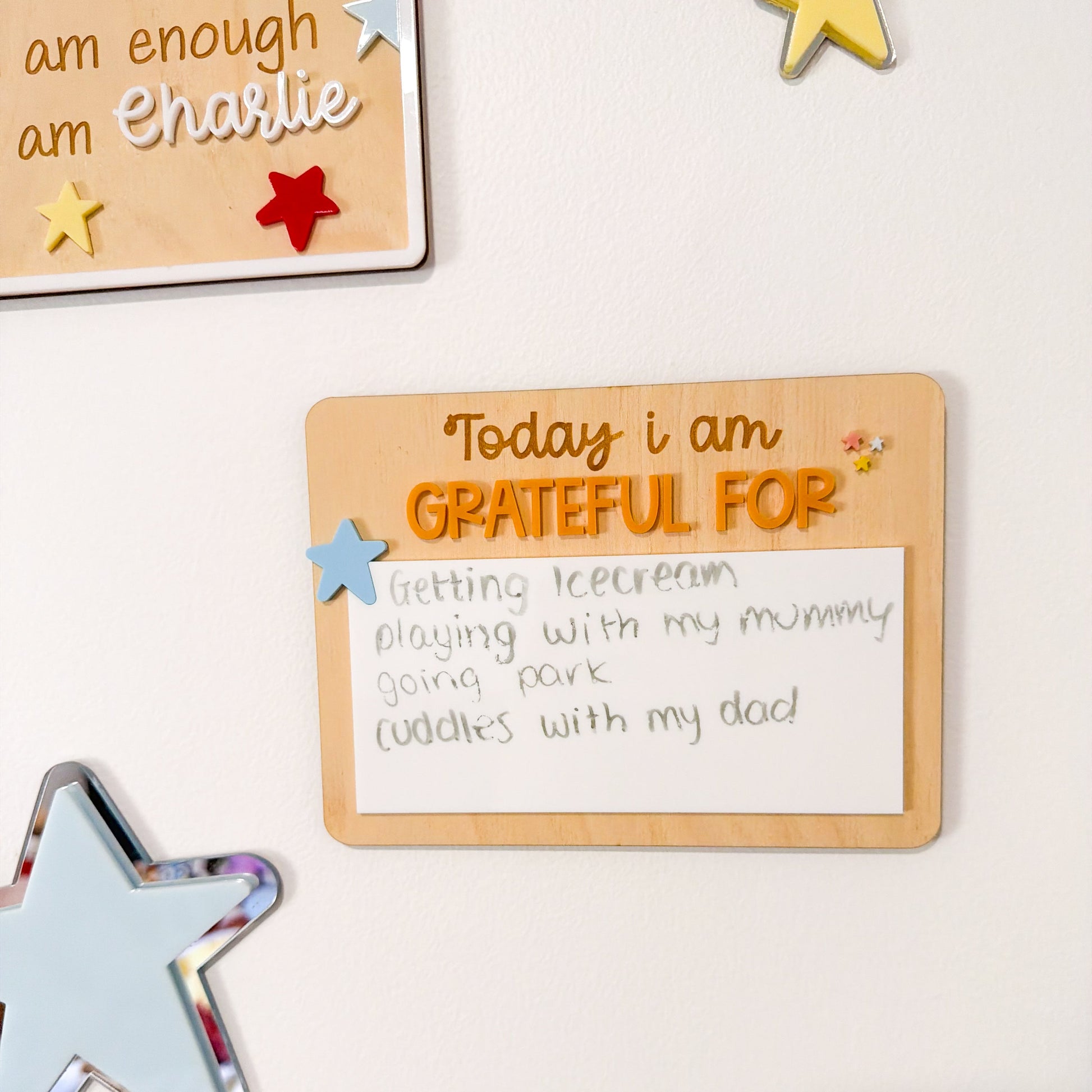 Wooden board with 'Today I am grateful for' text on a white background